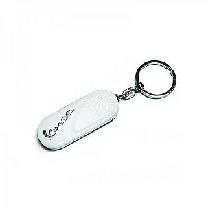 Chromed key ring with a red background 
